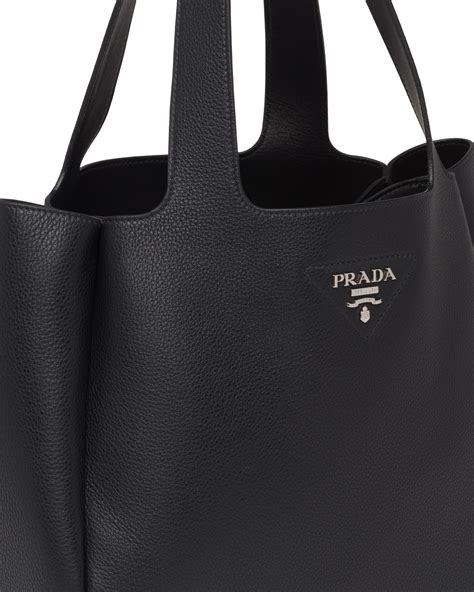 prada plaszcz|Prada leather handbags.